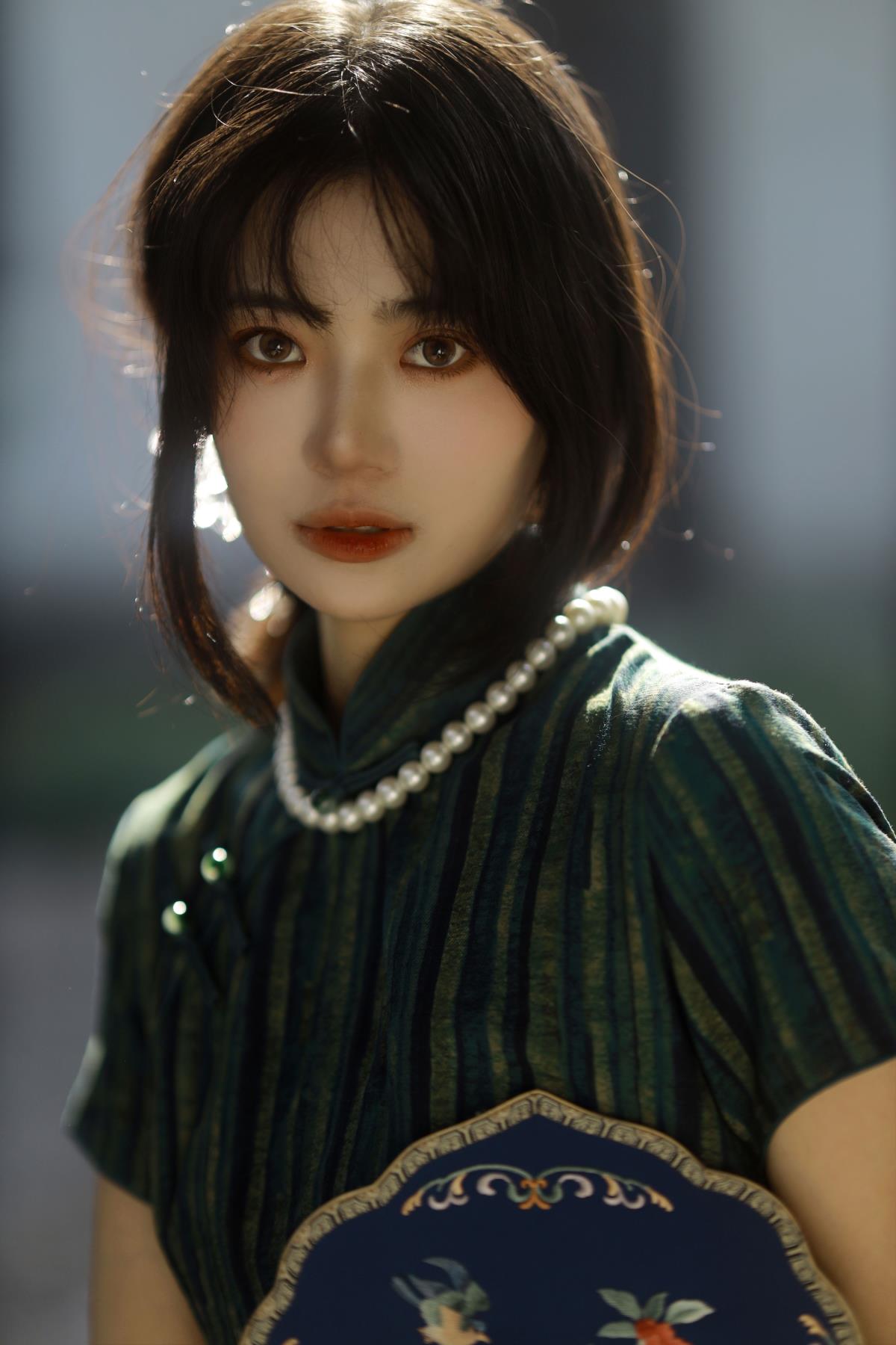 着绿意旗袍，赴江南之约